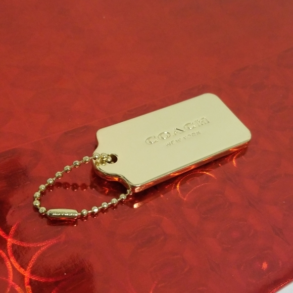 Coach gold metal hang tag Clearance